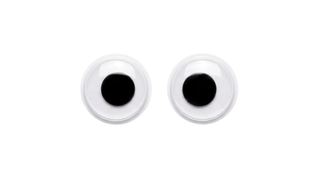 A pair of plastic wiggly googly eyes isolated on black background. Funny craft supplies for kids projects, creative design, playful expression, and abstract art concepts.