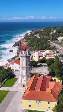 Guia Lighthouse In Cascais District Of Lisbon Portugal. Iconic Structure Of The Historic Lighthouse In A Coastal City. Bay Water Landscape. Seaside Beach. Cascais District of Lisbon.