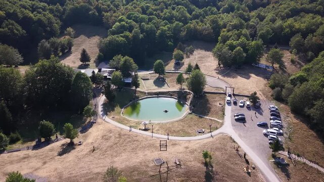 Aerial View of Javorov Do Recreational Park with Small Lake and Parking Lot Above Bjelasnica, Bosnia and Herzegovina
