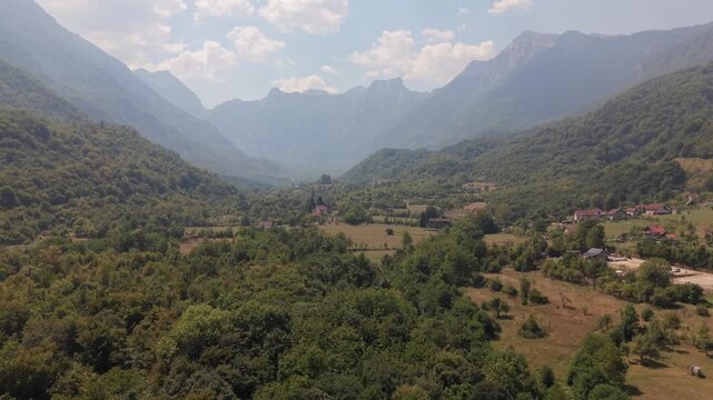 Aerial View of Forest Valley Below Smoke Covered Prenj Mountain Range during Wildfires, Bosnia and Herzegovina