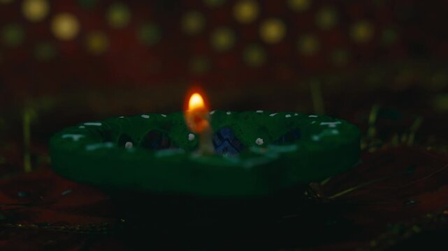 Traditional clay diya oil lamp burning for diwali
