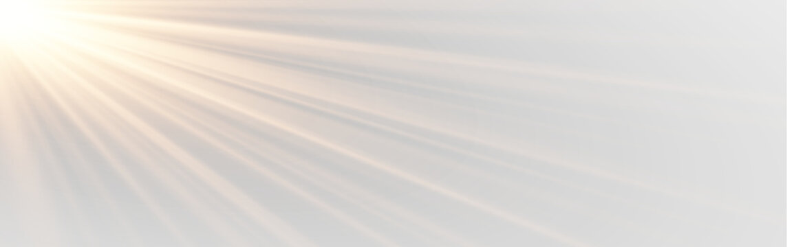 Bright sunburst light effect with golden sun rays beaming from the left side