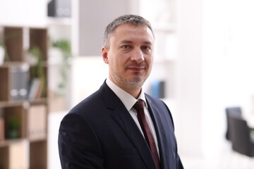 Fototapeta premium Portrait of lawyer wearing jacket in office