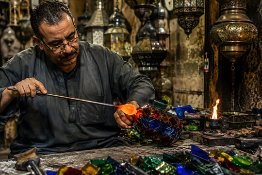 Artisan Glassblower Crafting Traditional Stained Glass Lantern