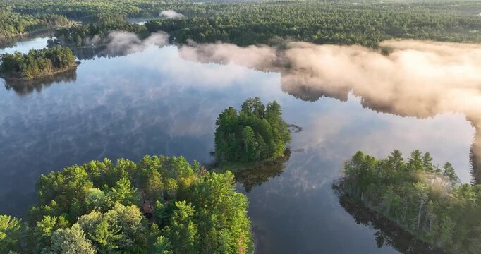 Aerial View of Misty Forest Lake in Michigan Upper Peninsula