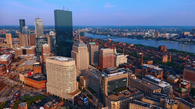 Flight over high-rises in Back Bay neighborhood. Approaching 200 Clarendon Street skyscraper standing out from the cityscape of Boston, Massachusetts, USA.