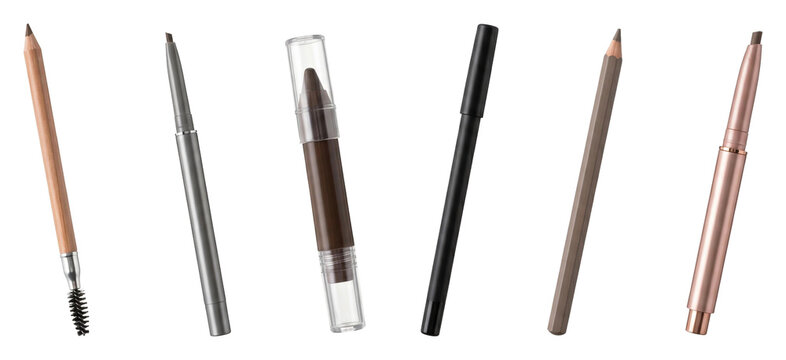 Set of various eyebrow pencils and liners including retractable, wooden, and crayon types with a spoolie brush for professional makeup application and beauty grooming