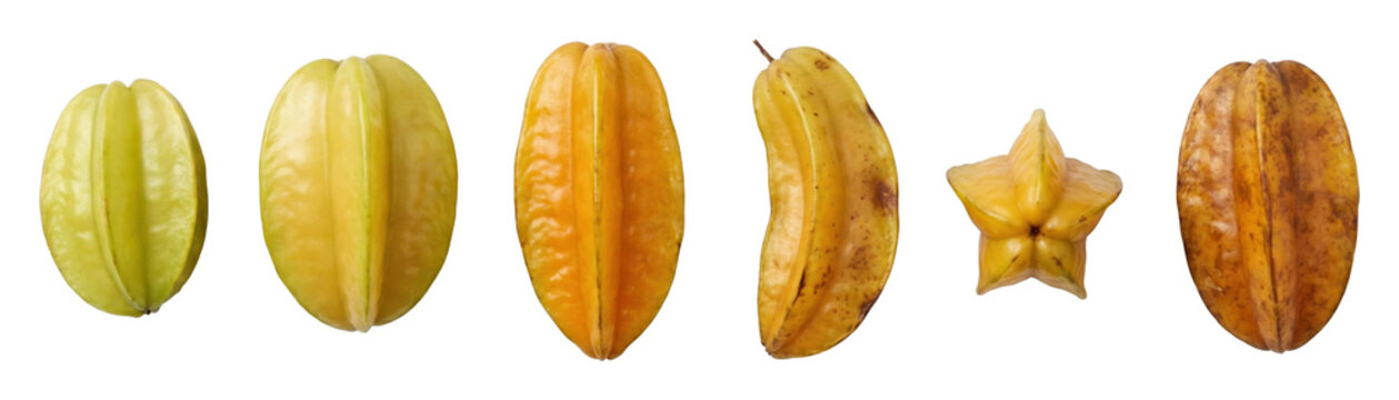 Collection of six carambola star fruits showing the different stages of ripening from unripe green to overripe brown, arranged in a row to illustrate the life cycle
