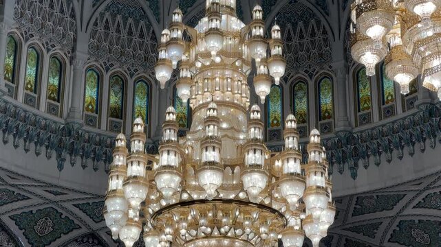 Gold plated chandelier studded with Swarovski crystals inside Sultan Qaboos Grand Mosque in Muscat Oman