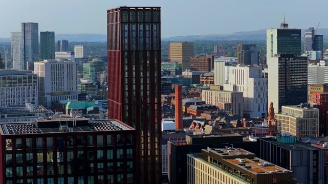 Aerial video of Manchester Skyline over the Oxford Road. 