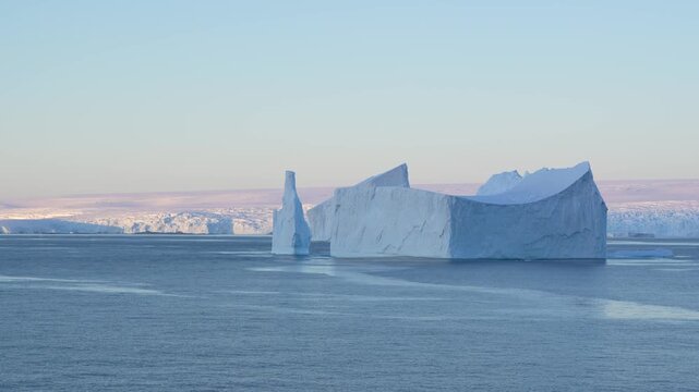 Antarctica Huge Tabular Iceberg at Sunset. Beautiful Snow Covered Mountains Epic Nature Remote Destination. Incredible Panoramic Vista Travel