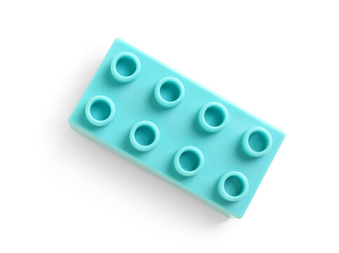 Blue plastic building block on white background