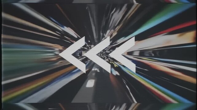 Authentic retro VHS tape rewind animation with analog noise and chevron arrows stock footage.