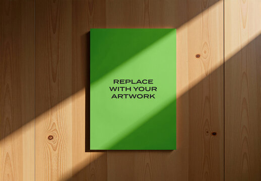 Vertical poster mockup displayed on a wooden wall with natural window light, realistic art presentation in an indoor setting, interior design context, blank
