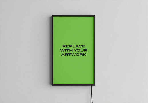 Vertical framed poster mockup with placeholder background displayed on a light gray wall, realistic art presentation featuring black frame and visible power cable