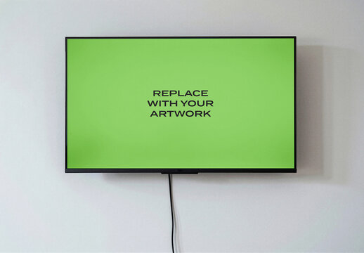 Flat screen television mockup mounted on a white wall with green displaying replace your artwork text, interior office or home environment, horizontal orientation, Template
