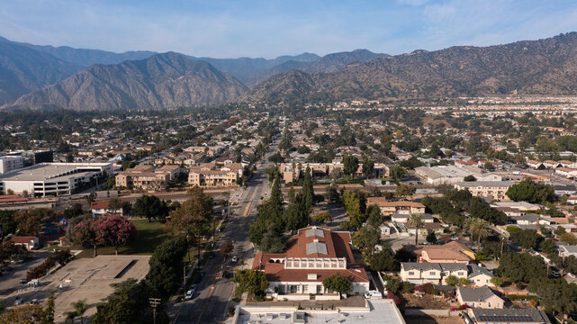 Afternoon sun illuminates historic architecture in downtown Azusa, California, USA.