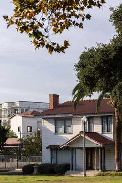 Afternoon sun shines on historic buildings in downtown Azusa, California, USA.