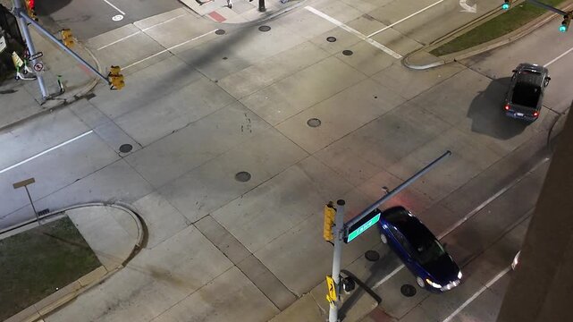 View of Vehicles at Downtown Detroit Street Intersection