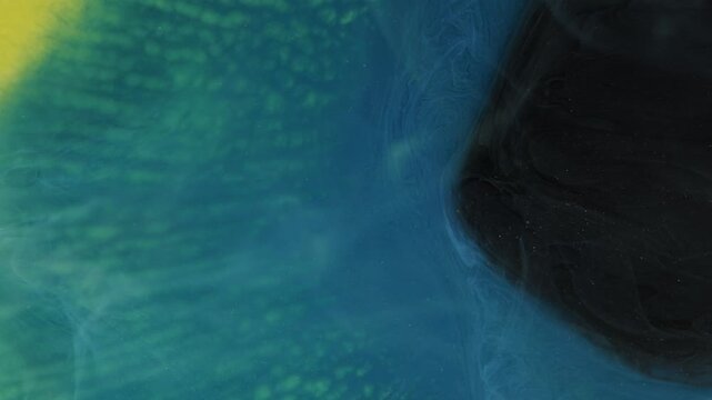 Shooting paint underwater and watching colors spread in clear water