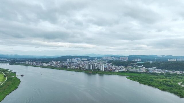 Aerial Drone View of Han River Waterfront and Cityscape in Yeoju, Gyeonggi-do, South Korea