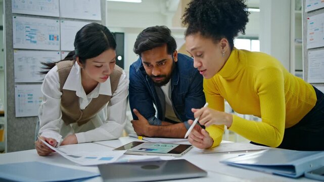 Group of creative Businesspeople brain storm meeting presentation,discussing roadmap to product launch, planning,strategy,dashboard,new business development,working with new startup project in office