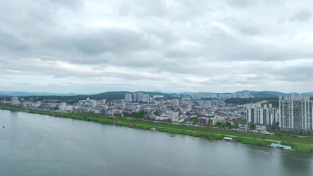 Aerial Drone View of Han River Waterfront and Cityscape in Yeoju, Gyeonggi-do, South Korea