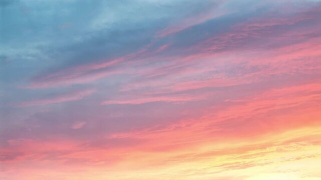 Beautiful pastel sunset sky with vibrant pink and blue clouds