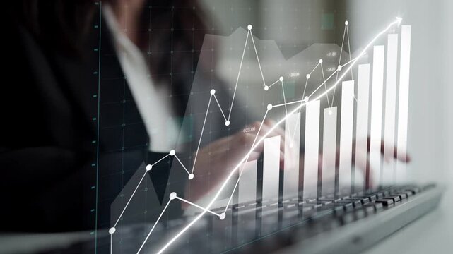 A businesswoman analyzes financial data using a laptop in a modern office. Digital graphs and charts depict trends and growth, showcasing success strategies in finance. Copula