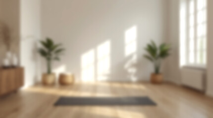 Fototapeta premium Blurry background of bright minimalist yoga studio with mat on wooden floor and plants.