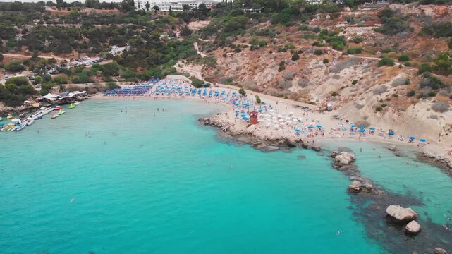 Aerial view of turquoise mediterranean sea waters and sandy Konnos beach in Ayia Napa Cyprus.