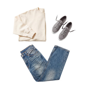 Comfortable casual outfit for everyday wear: cream sweatshirt, blue denim jeans, and gray canvas sneakers.