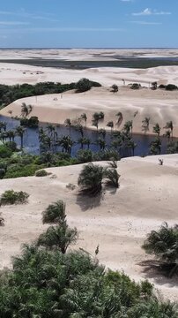 Small Sheets In Paulino Neves Maranhao Brazil. Beautiful Lagoons That Form In The Sand Dunes After The Rainy Season. Tropical Skyline. Bay Water Landscape. Paulino Neves Maranhao.