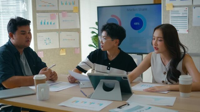 Group of creative Businesspeople brain storm meeting presentation,discussing roadmap to product launch, planning,strategy,dashboard,new business development,working with new startup project in office