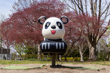 Panda-shaped playground equipment in a park in Japan © Schilo