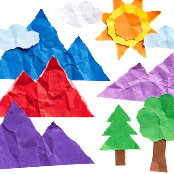 Colorful paper-cut landscape components: sun, clouds, mountains, and green trees for outdoor themes.