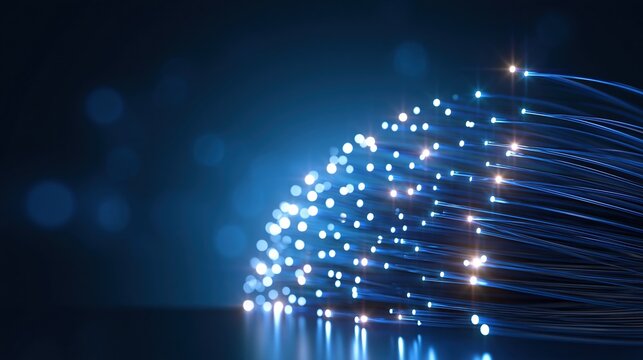 Close-up of glowing blue fiber optic strands conveying data and light in a dark, futuristic digital network