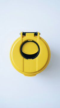Yellow safety lid with occupational health focus on white background