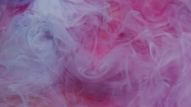 Ink bright vapor. Underwater fume. Blur purple blue yellow color cloud splash acrylic flow spreading on abstract creative background.