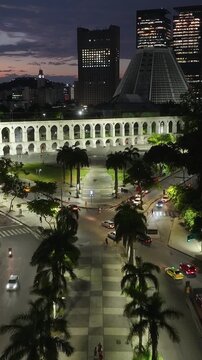 Arches Of Lapa In Rio De Janeiro Brazil. City Skyline Showing Modern And Traditional Architecture. Sunset Downtown Cityscape. Golden Hour Skyline. Rio de Janeiro Brazil.
