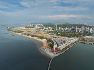 Fototapeta premium Aerial view of Ha Long coastal city and beach in Quang Ninh, Vietnam