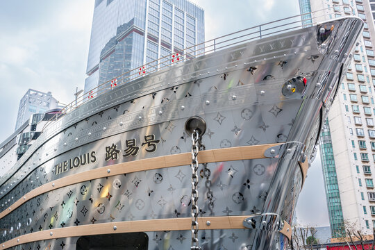 Front of The Louis a Louis Vuitton boat shaped concept store with name in Shanghai China