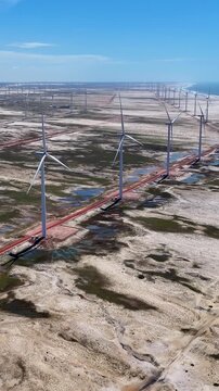 Wind Farm In Paulino Neves Maranhao Brazil. Wind Turbines Generating Clean Energy In A Coastal Landscape. Beach Landscape. Summer Backgrounds. Paulino Neves Maranhao.