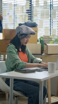 Women use laptop or phone for home office,package and e commerce checklist with stock to customer.Small business people with digital tech,logistics fulfillment,box and phone for online website order