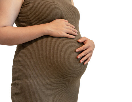 Close-up of a pregnant belly in a brown knit dress cradled by both hands, isolated on a transparent background.