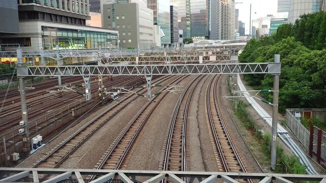 Class 923 'Doctor Yellow' (T5 set) track inspection bullet train running through Tokyo's business district