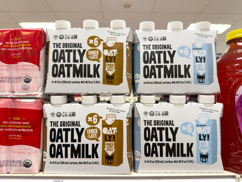 Oatly Original Oatmilk Multipacks On Store Shelf
