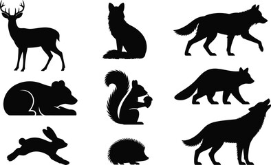 Obraz premium Set of black silhouettes of various forest animals including deer, fox, wolf, bear, squirrel, raccoon, rabbit, and hedgehog