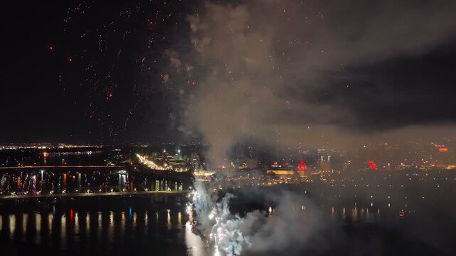 Ottawa, Canada, fireworks over Parliament Hill and the Ottawa River amid heavy smoke, haze and air pollution. g.