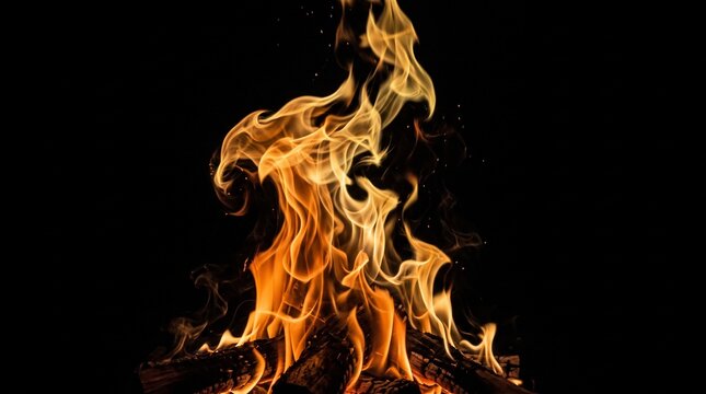 Fireplace fire transparent burning on dark wood logs